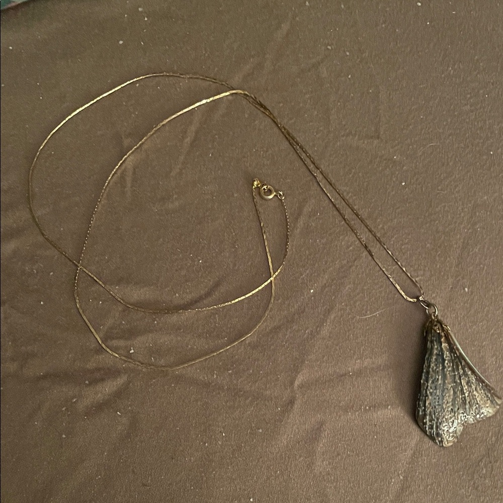 Elegant Gold and Silver Pendant Necklace